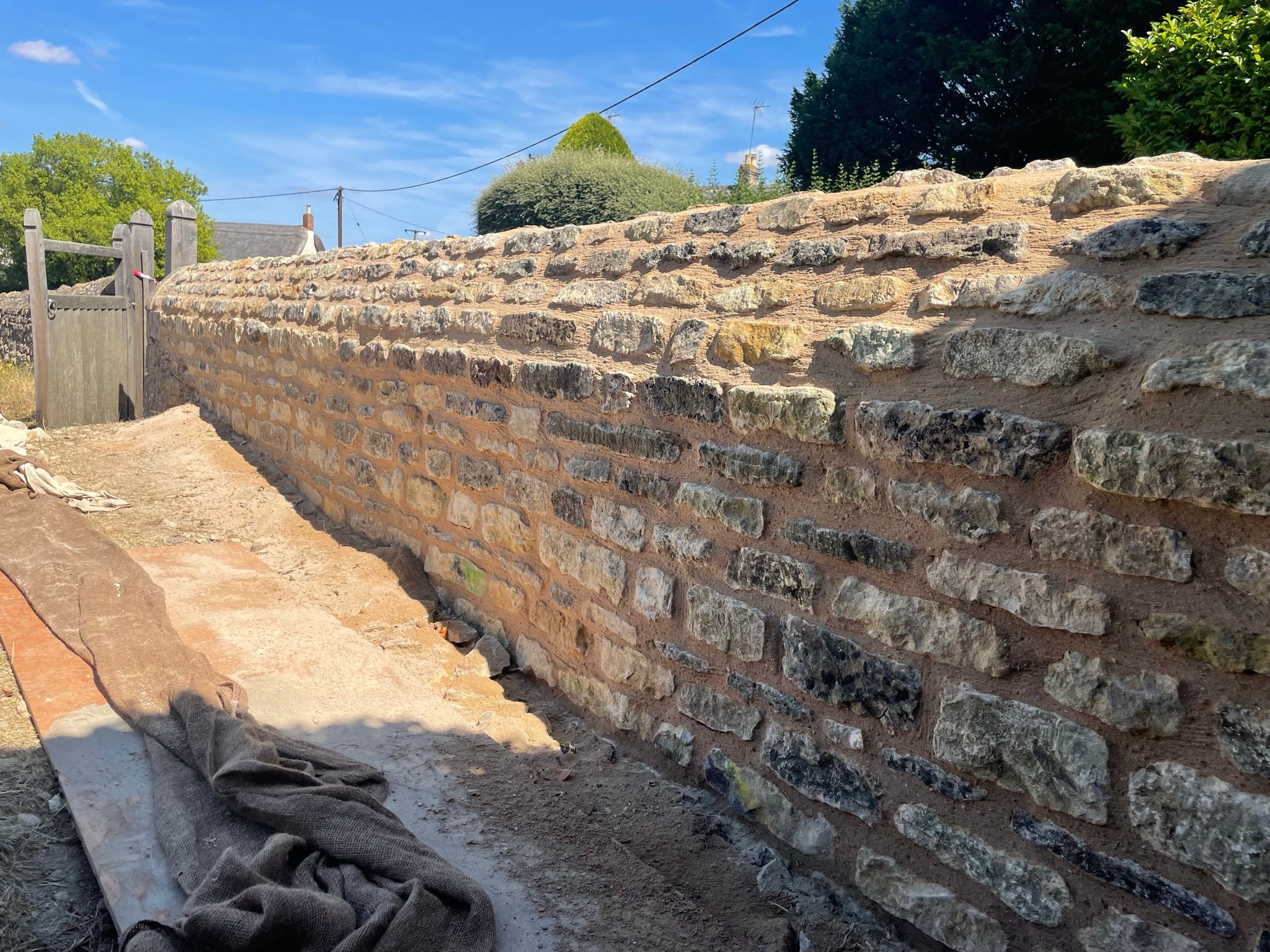 Stone wall renovation and rebuild
